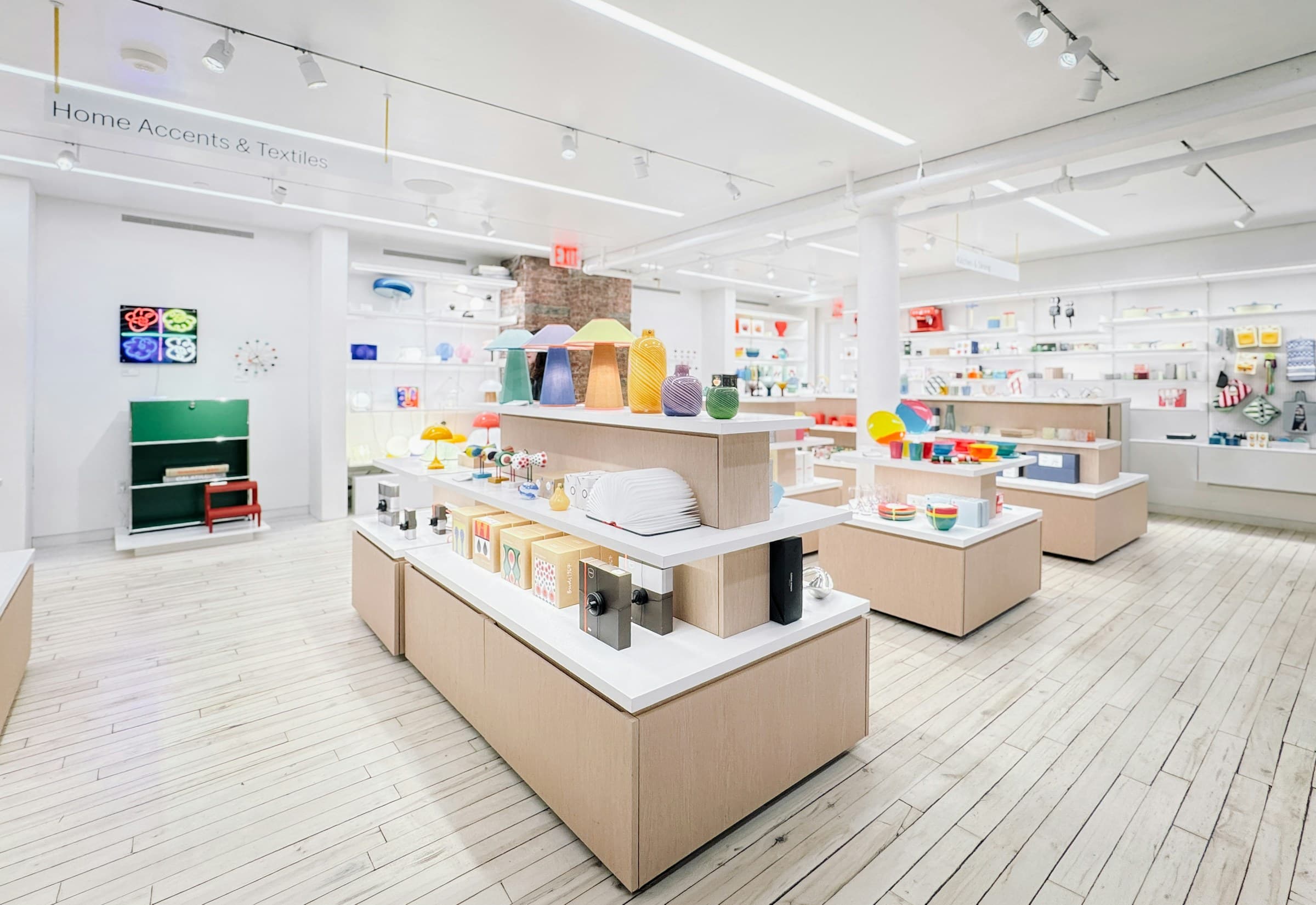 Bright retail store interior with low display tables of products